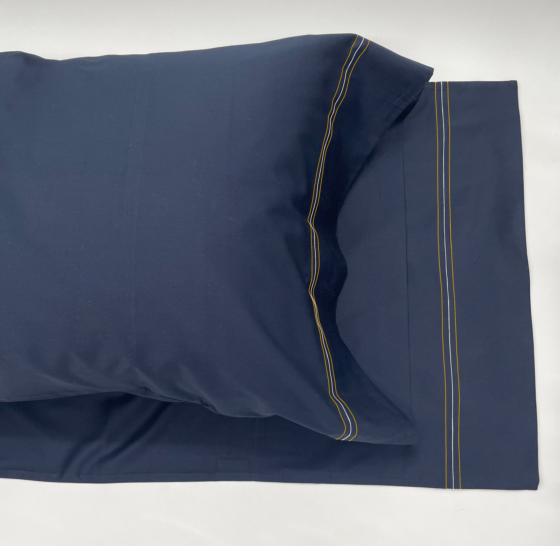 Narragansett Deep Sea Pillow Case with a triple contrasting stitch in Yellow, White and Yellow.