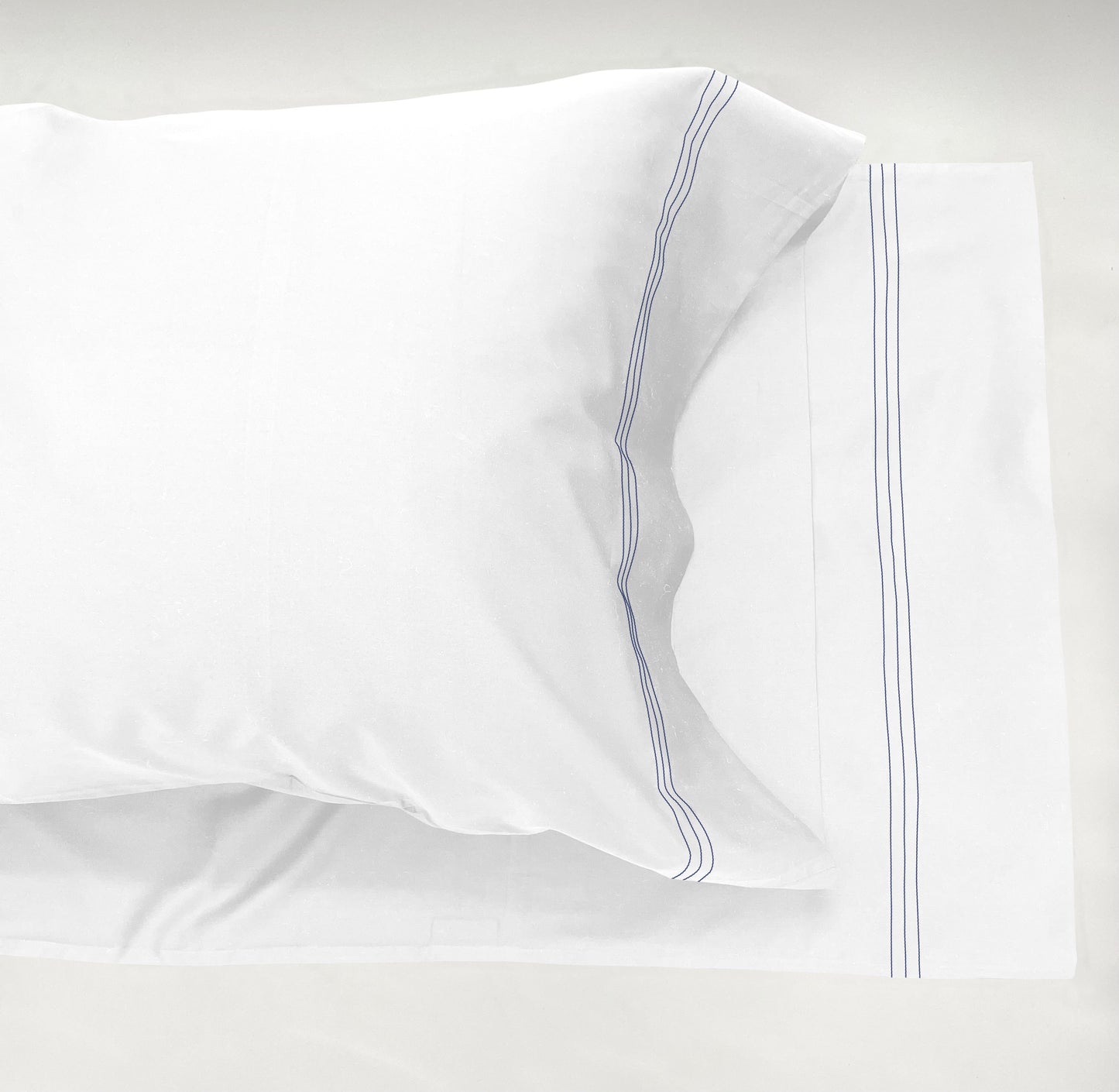 Narragansett White Pillow Case with a triple contrasting stitch in Deep Sea.