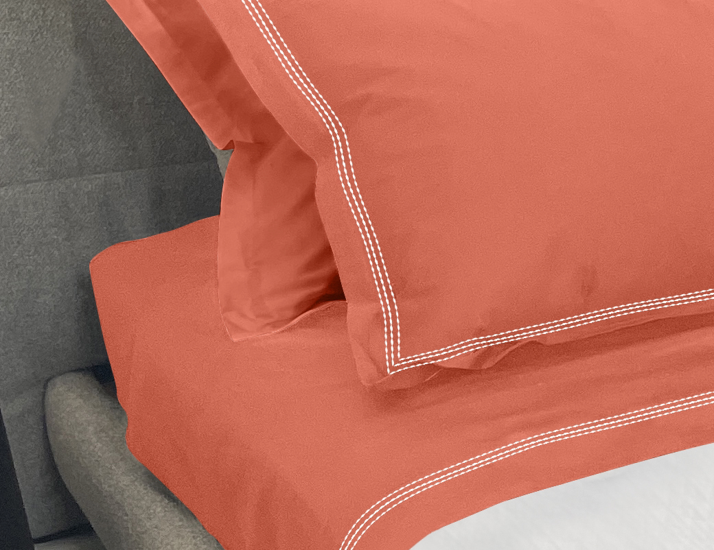 Narragansett Lobster Bottom Fitted Sheet, shown with Lobster Top Flat Sheet and Pillow Sham with a triple contrasting stitch in White. Also shown is our Daily Basics 300tc Egyptian Cotton Sateen Sleeping Sham in Lobster. 