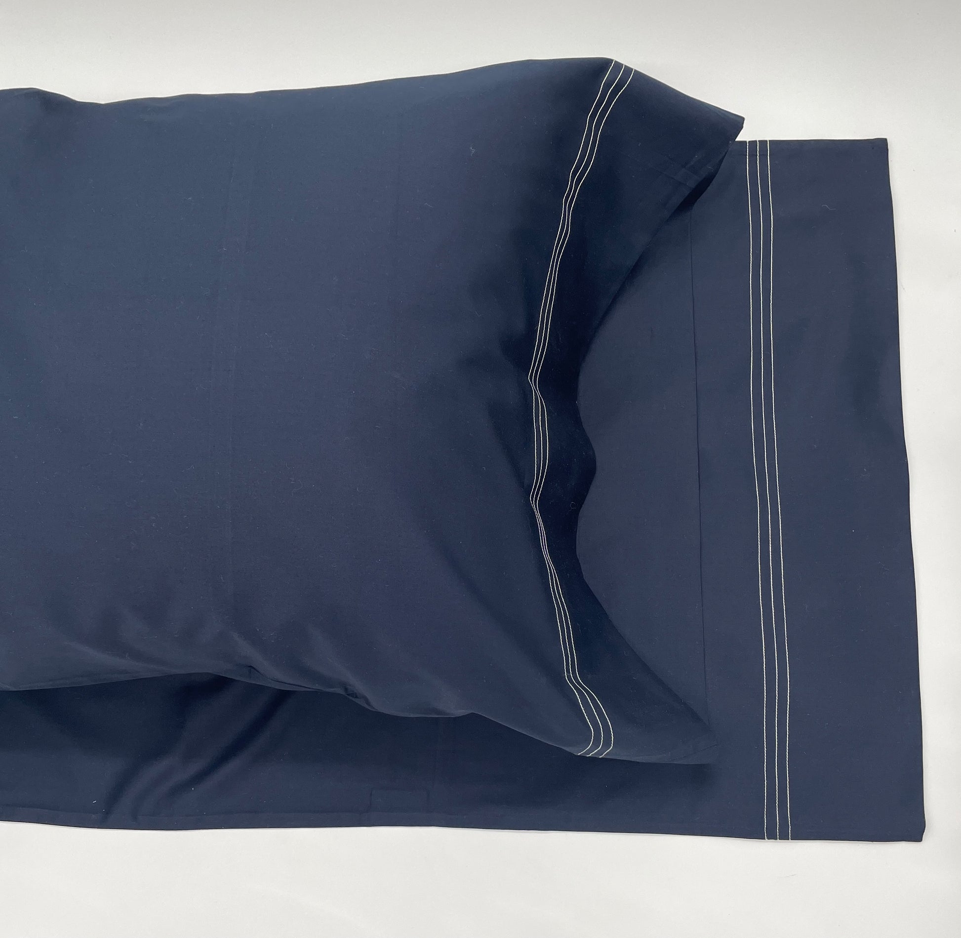 Narragansett Deep Sea Pillow Case with a triple contrasting stitch in White.