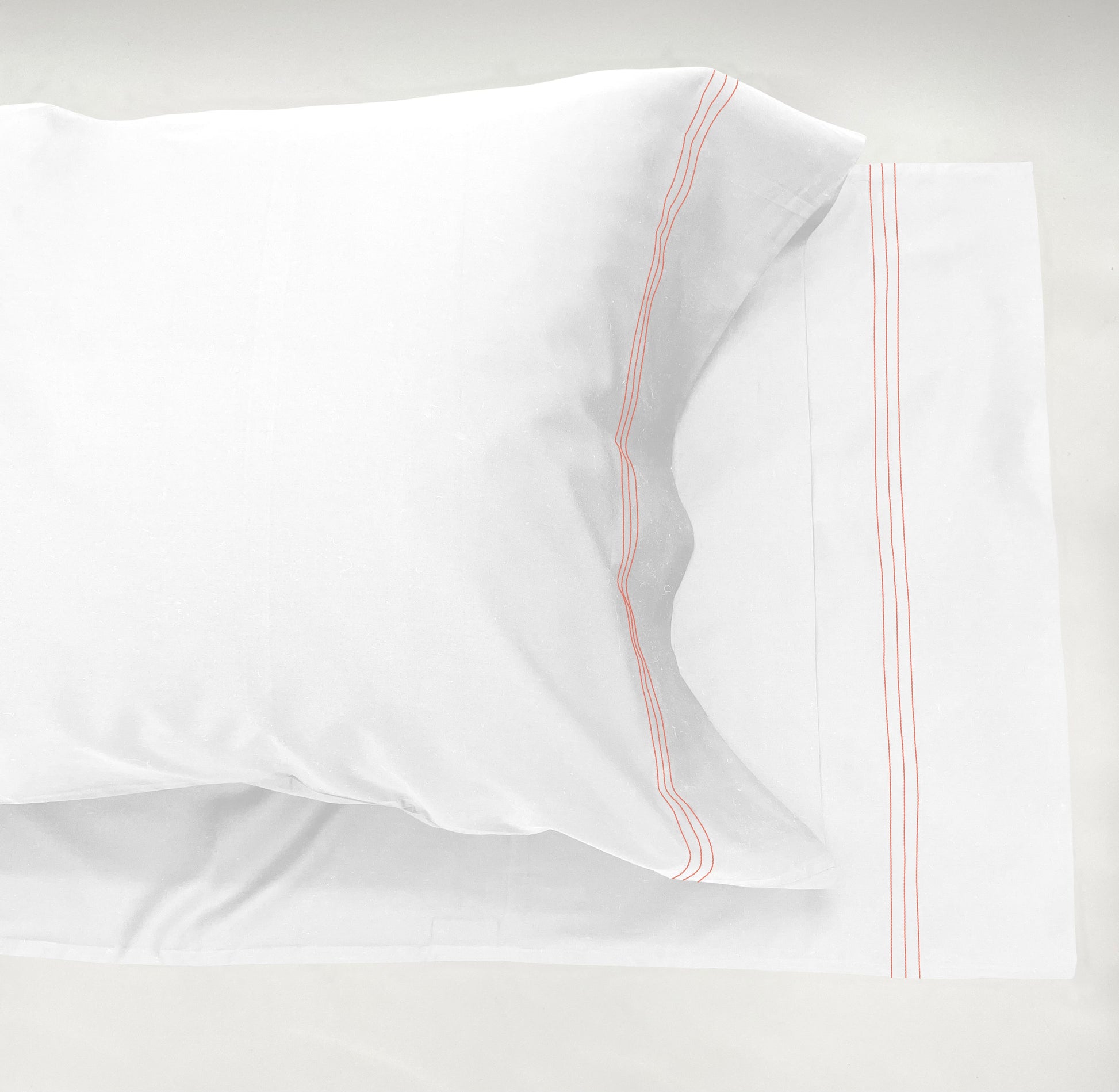 Narragansett White Pillow Case with a triple contrasting stitch in Lobster.